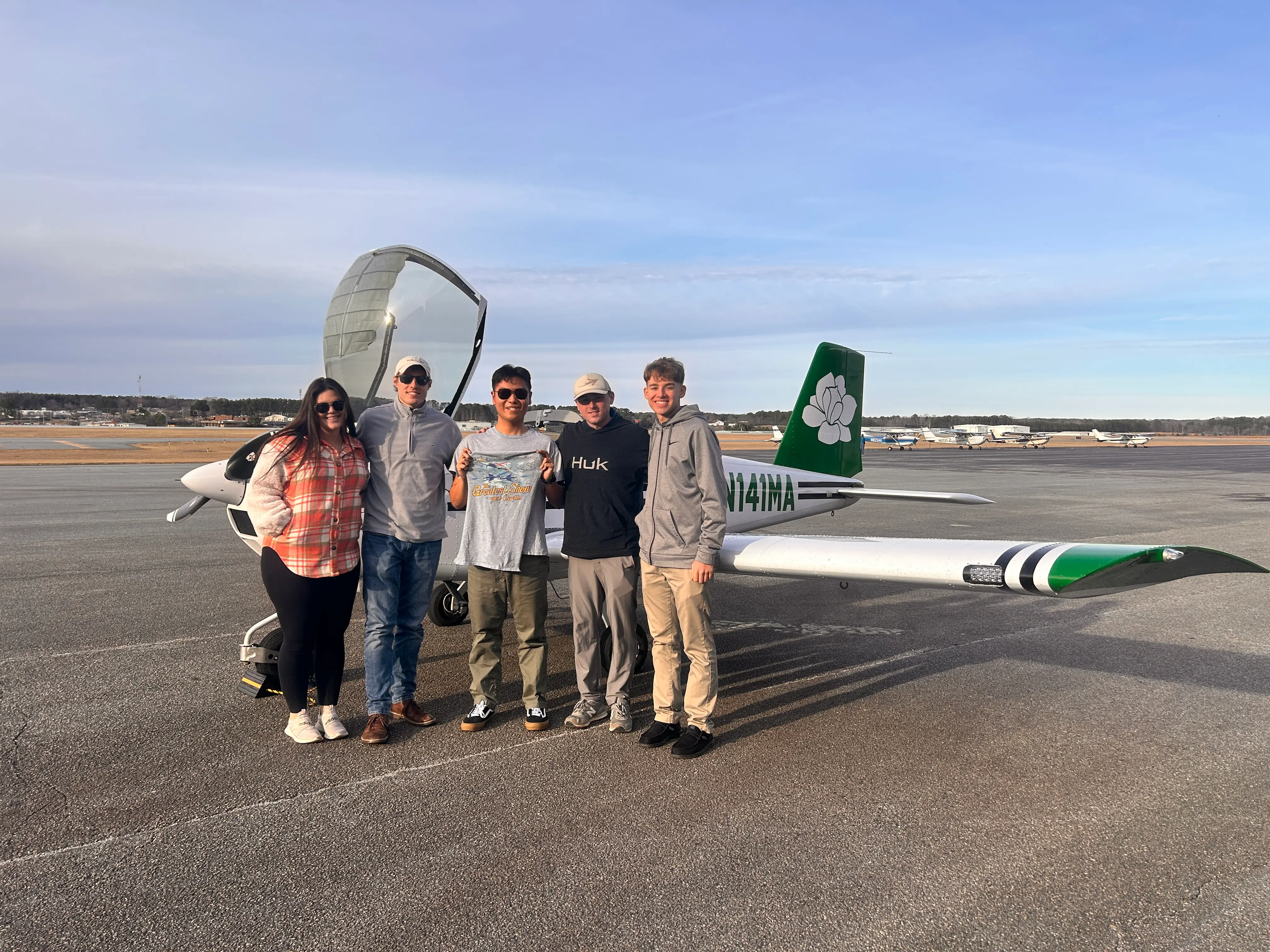 Magnolia Aviation Academy students with instructors posing