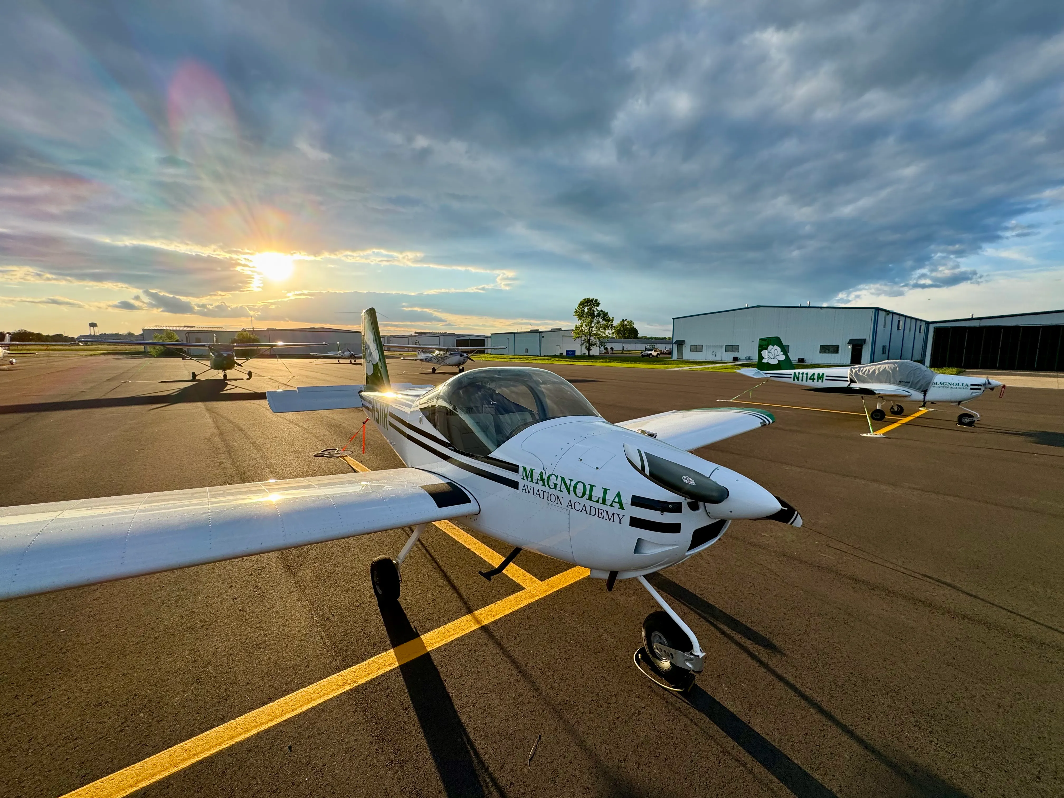 Magnolia Aviation Academy instructor helping a student prepare for flight training