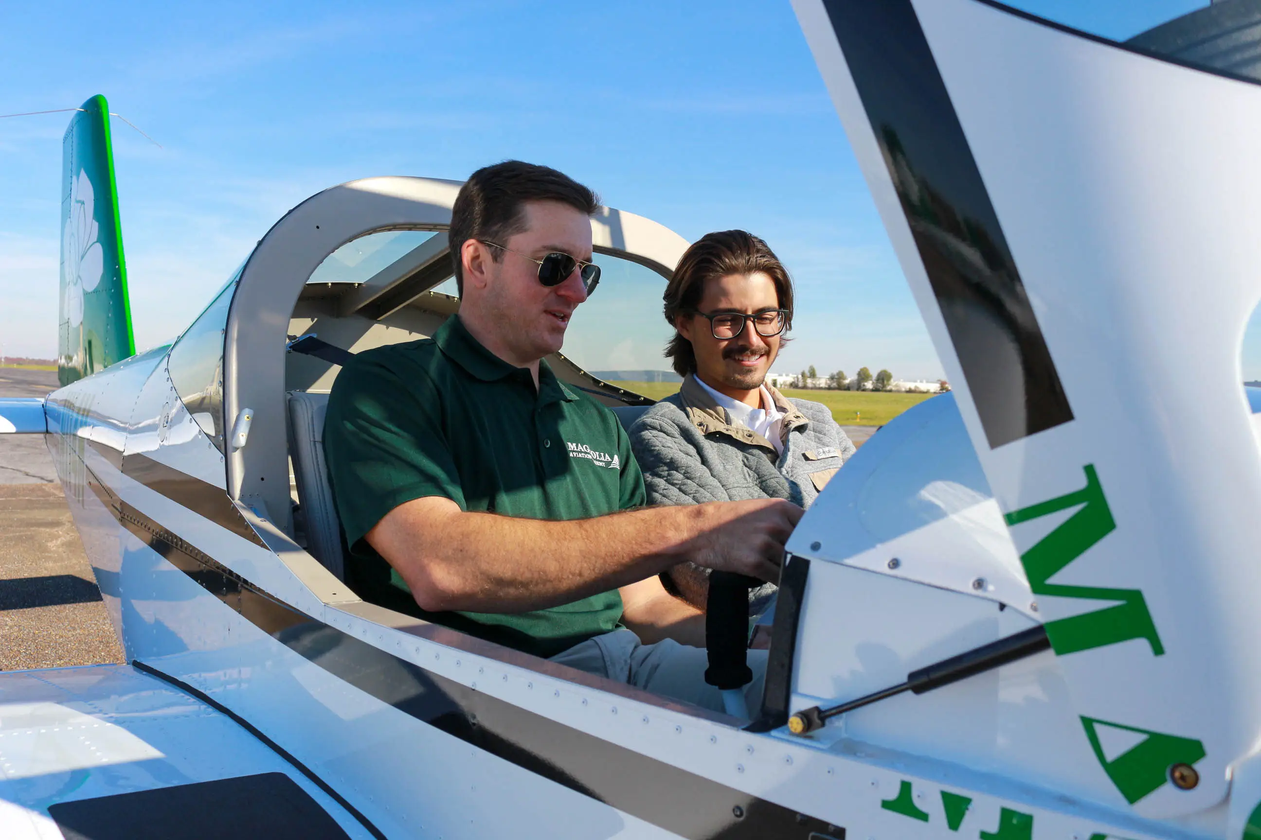 Magnolia Aviation Academy instructor and student inside a cockpit